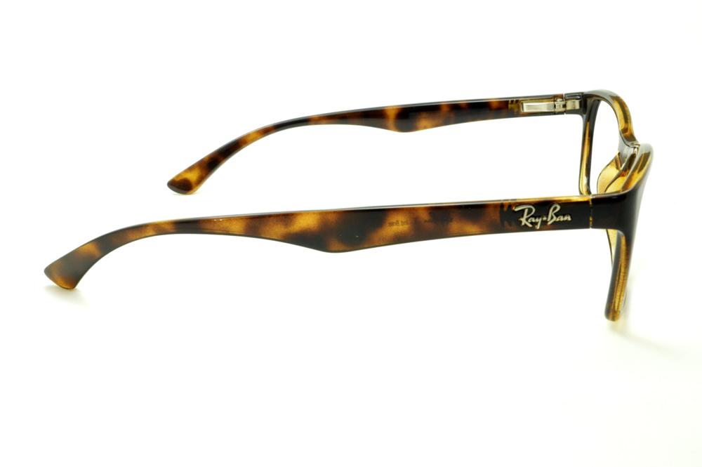 Óculos Ray-Ban tartaruga demi efeito onça em acetato com haste flexível de mola